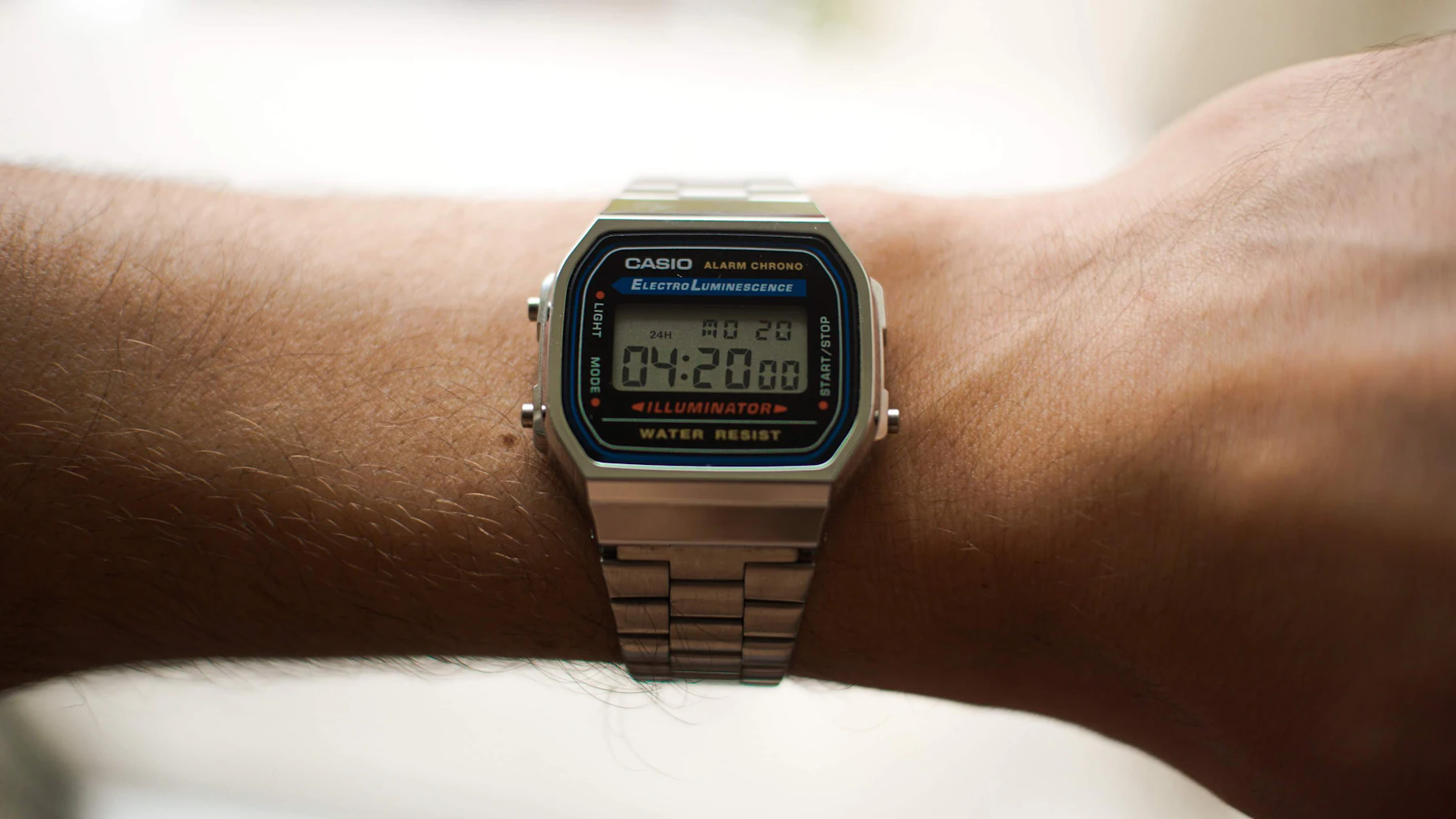 Vintage-style digital watch worn on the wrist