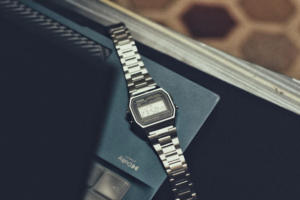Silver digital watch on a metal bracelet